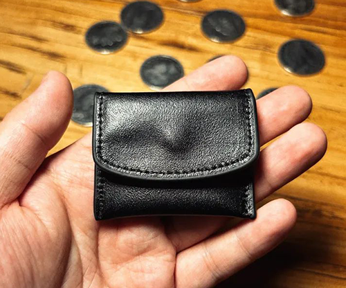 The Cowhide Coin Wallet (Black) by Bacon Magic - Trick